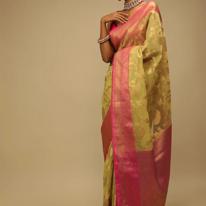 Celery Green Saree In Organza Silk With Golden Brocade Woven Floral Jaal And Magenta Border Design