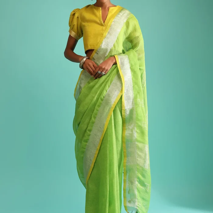 Parrot Green Saree In Linen With Silver Brocade Border And Striped Pallu Along With Yellow Unstitched Blouse